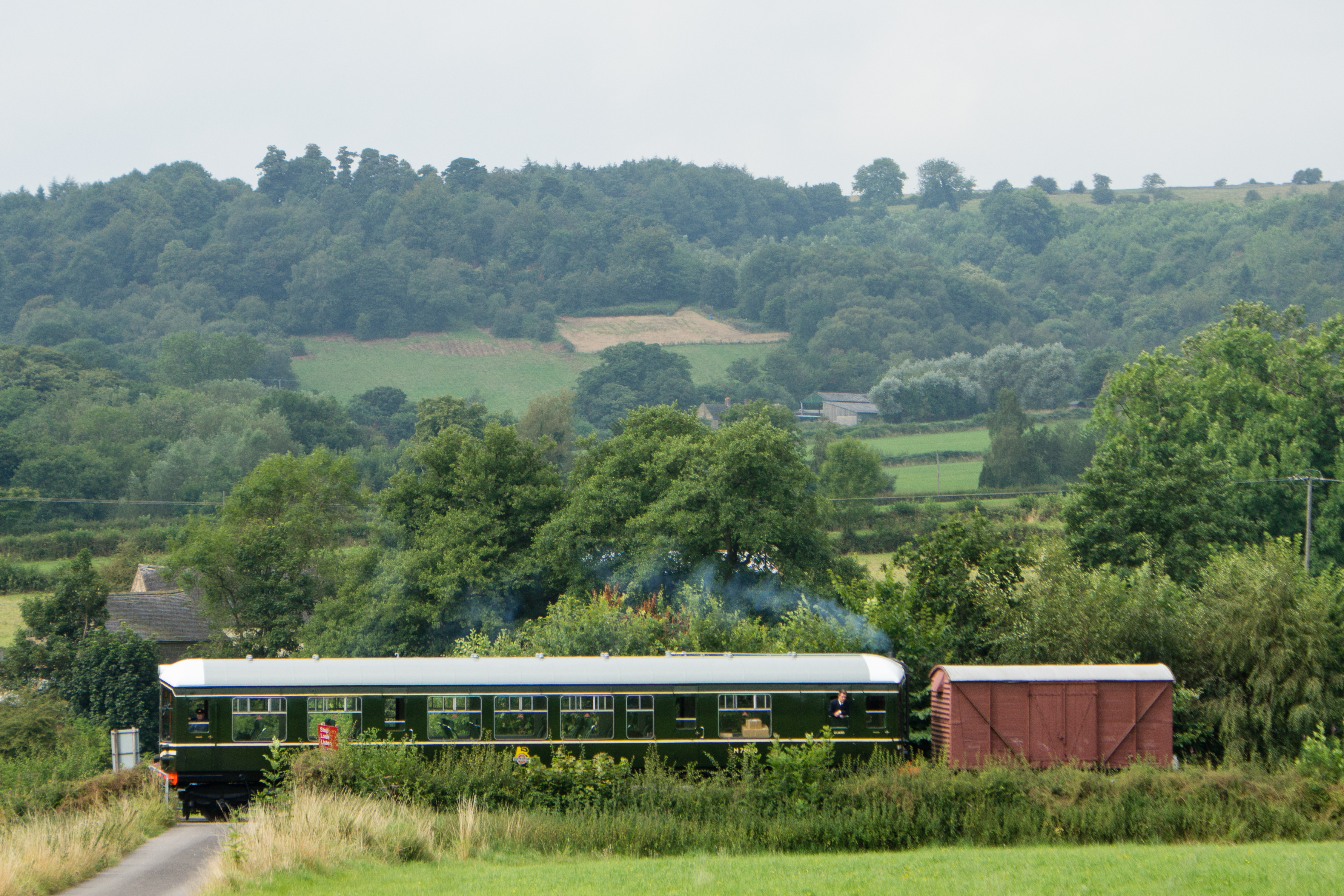 Iris and brake van passing Roland Crossing.